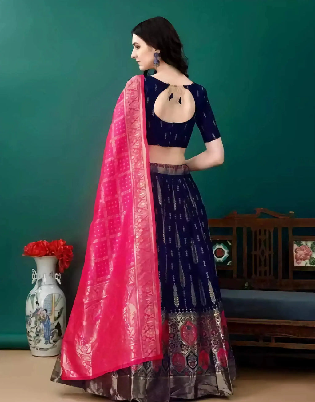 Close-up of Banarasi jacquard lehenga choli showing ethnic motif design and rich art silk fabric