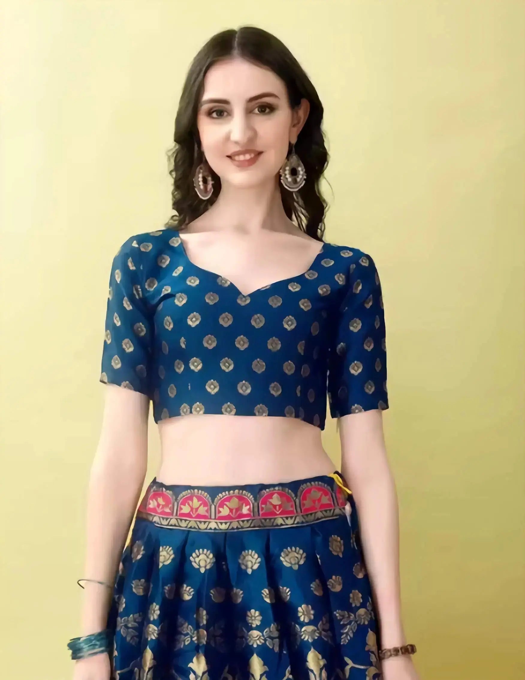 Close-up of embroidered art silk blouse fabric and detailing