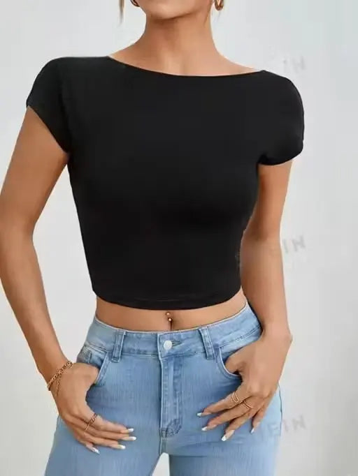 Women wearing black backless lycra top casual studio look