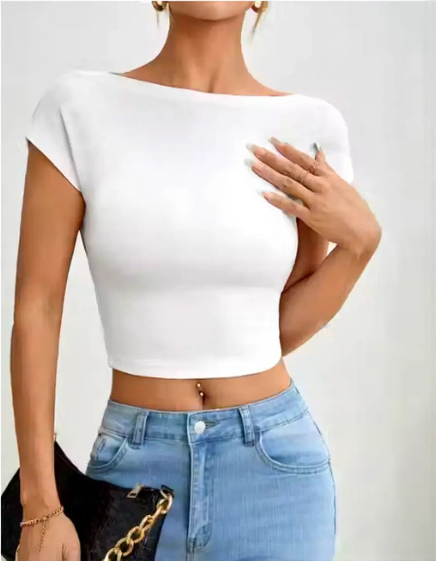 White backless lycra top paired with jeans women outfit