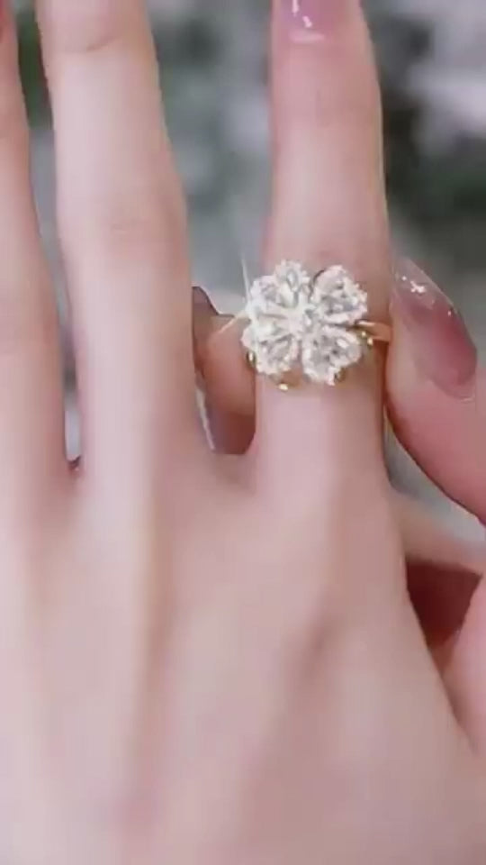Demo video of Four-Leaf Clover Spinning Gold Ring – Shows spinning feature, rose-gold finish, and styling on finger
