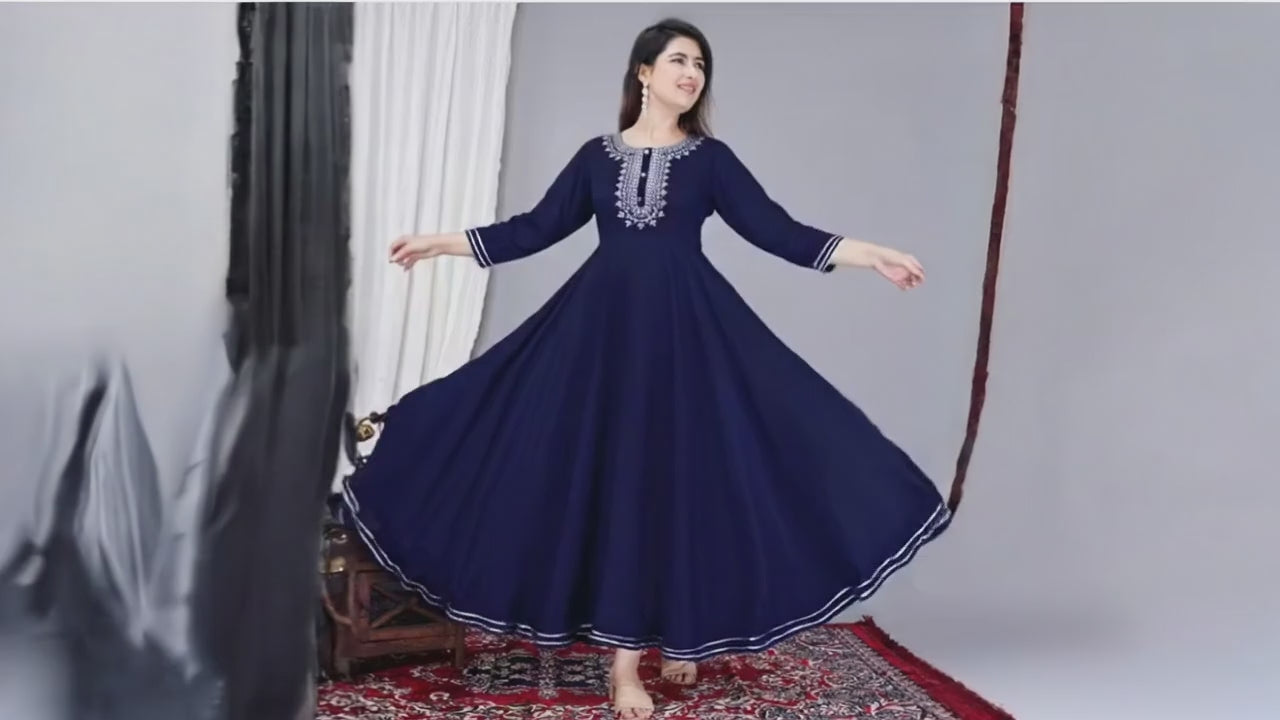 Women rayon Anarkali kurti showing fit fabric and embroidery details