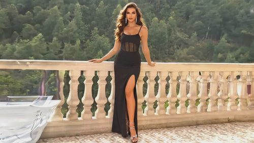 Video showcasing women's black split thigh cami dress fit and movement