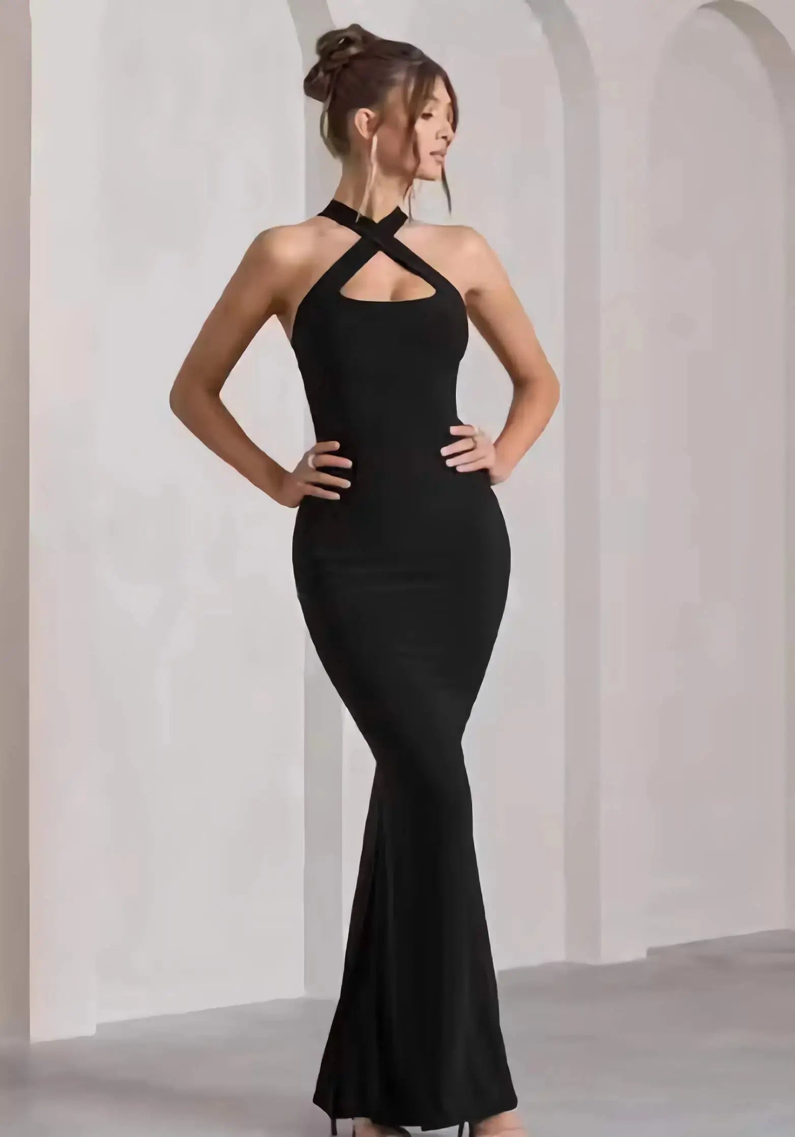 Sleeveless maroon bodycon dress styled for party wear