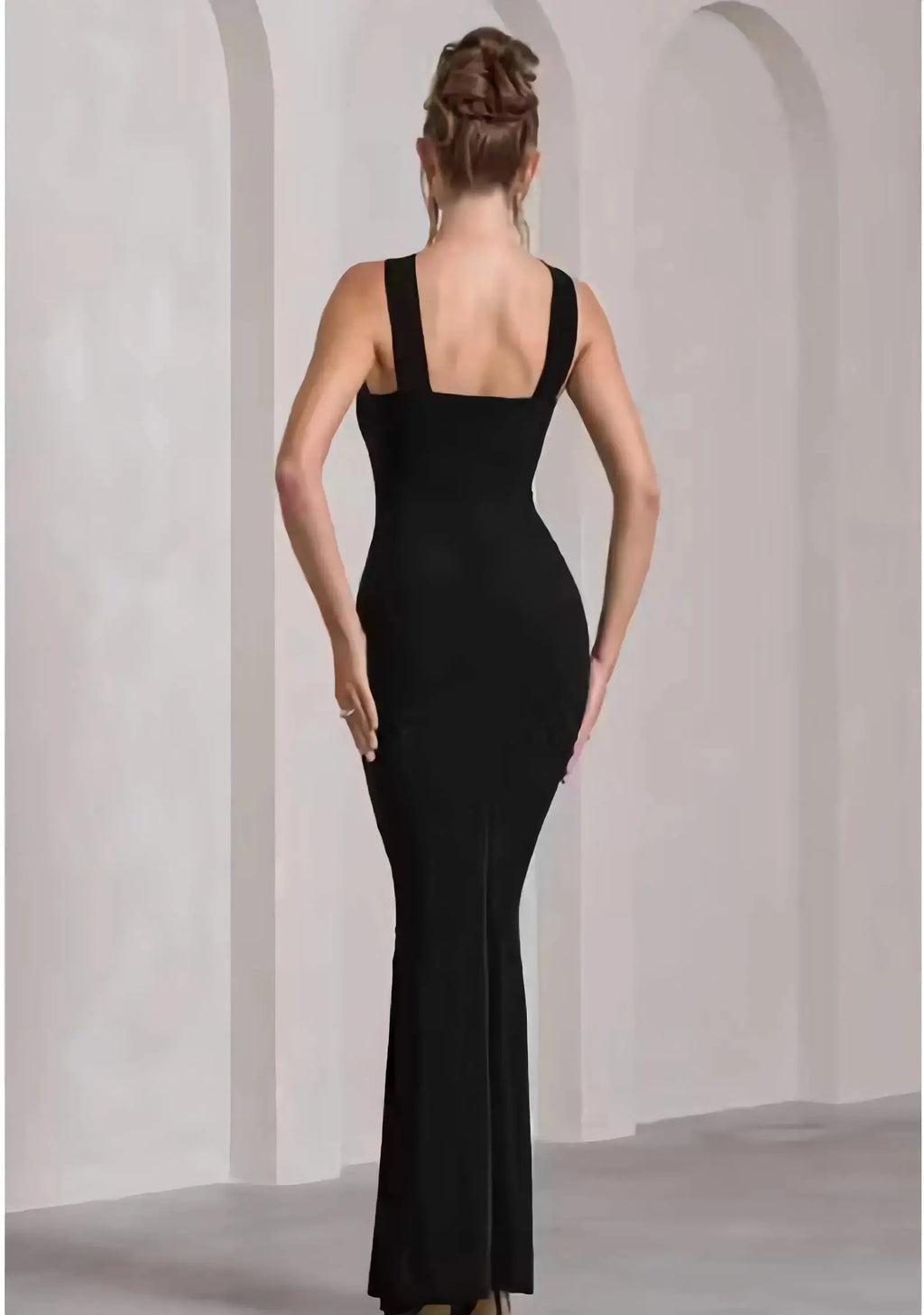 Back view of sleeveless black bodycon full length bodycon dress