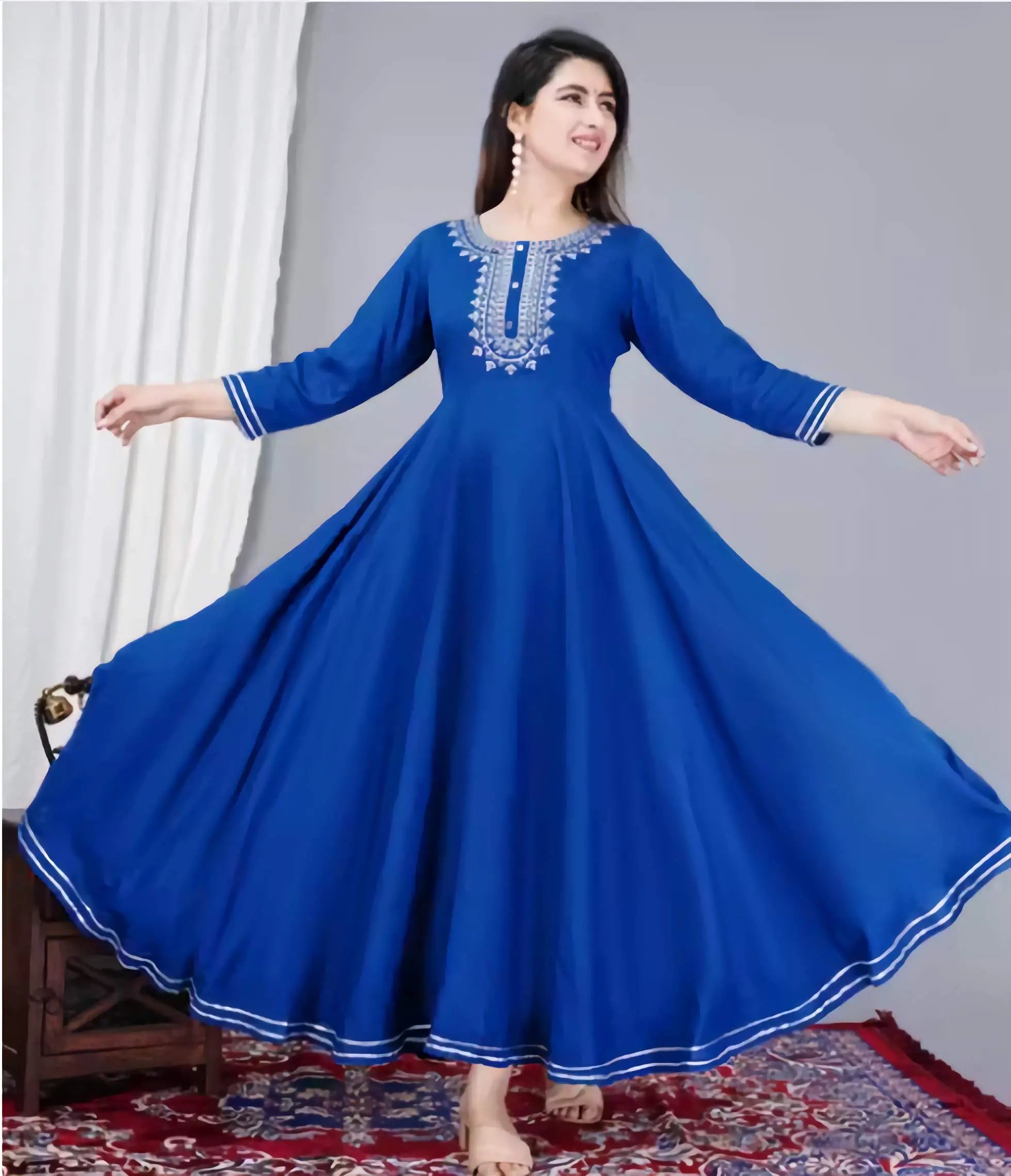 Blue women solid rayon Anarkali kurti with embroidered neck design and 3/4 sleeves